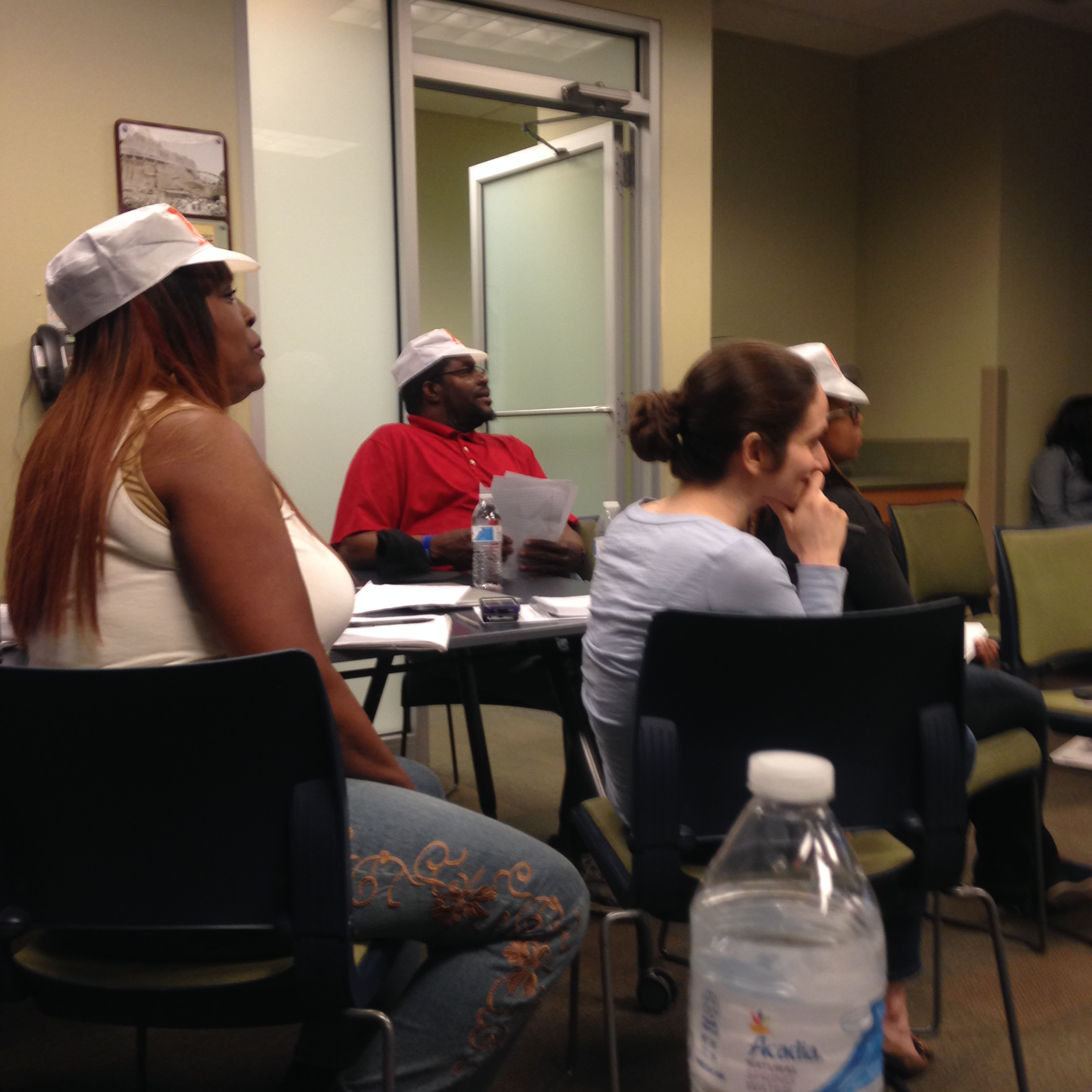 Listening to one another present during Trainers' Bootcamp