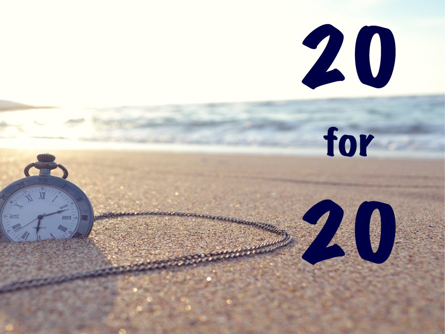 20 for 20 - image of pocket watch buried in sand on a beach