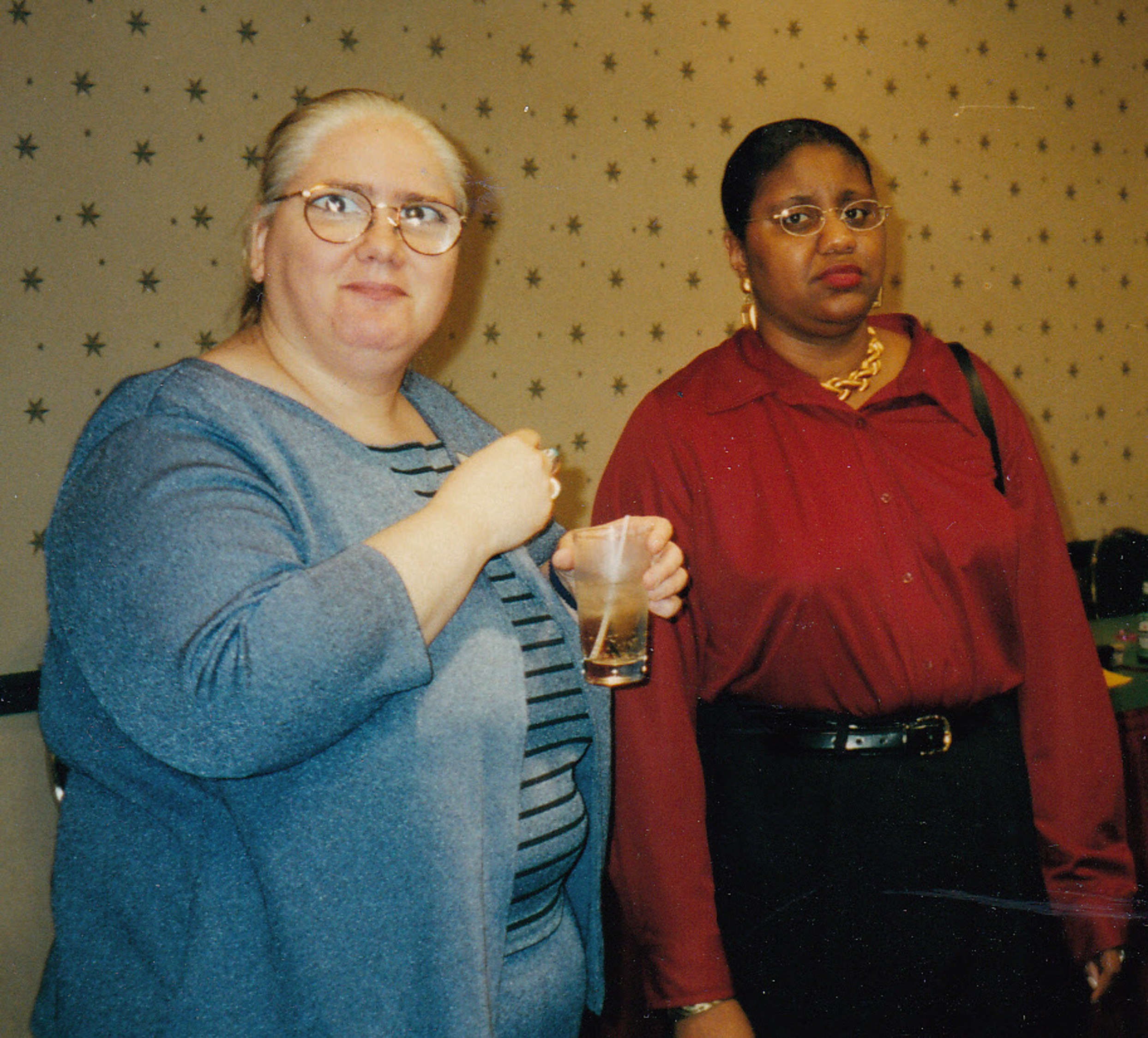 Diane and a woman caught off guard by the camera.