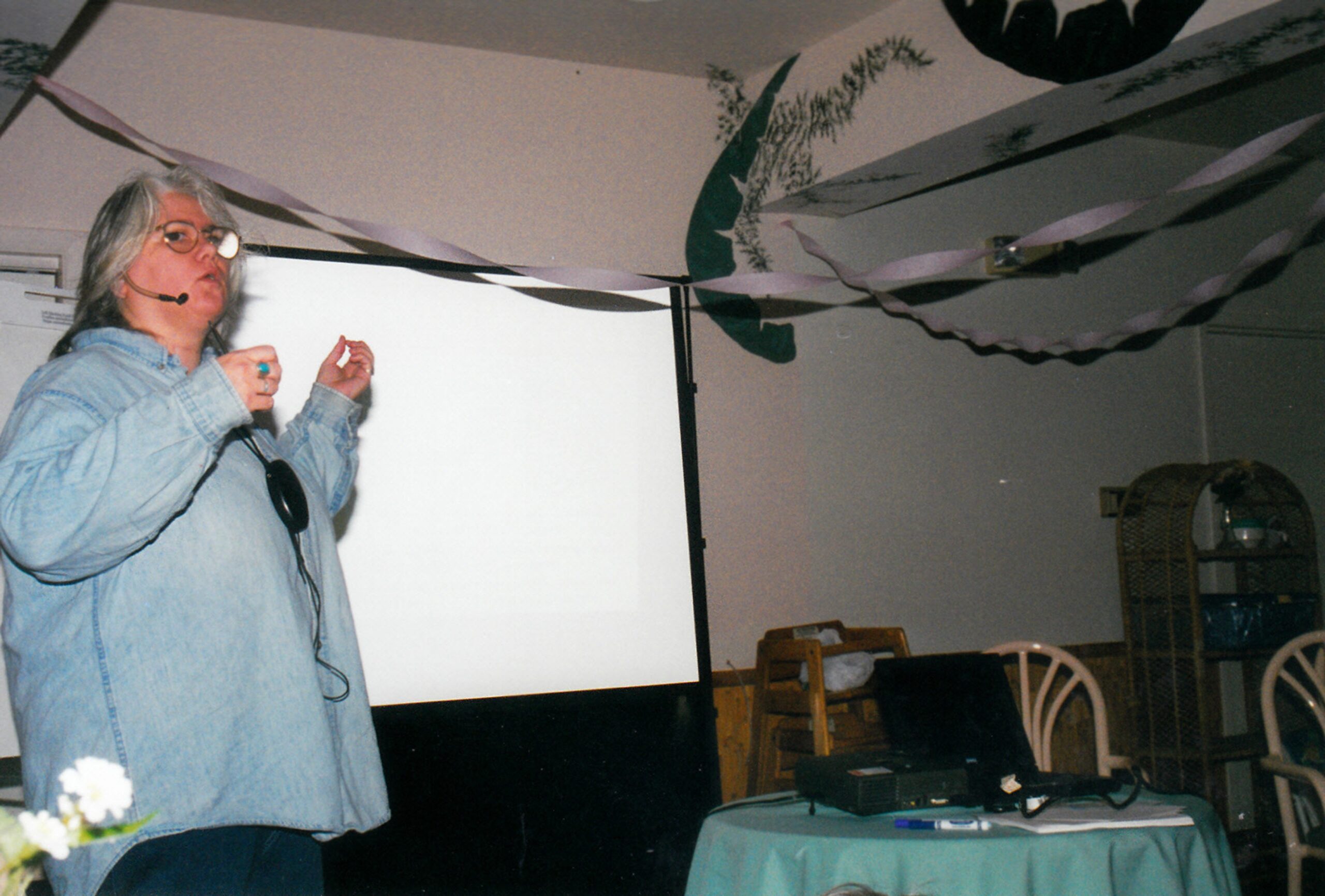 Diane is presenting at a networks’ retreat. There are festive streamers hanging from the ceiling. Maybe it was someone’s birthday?