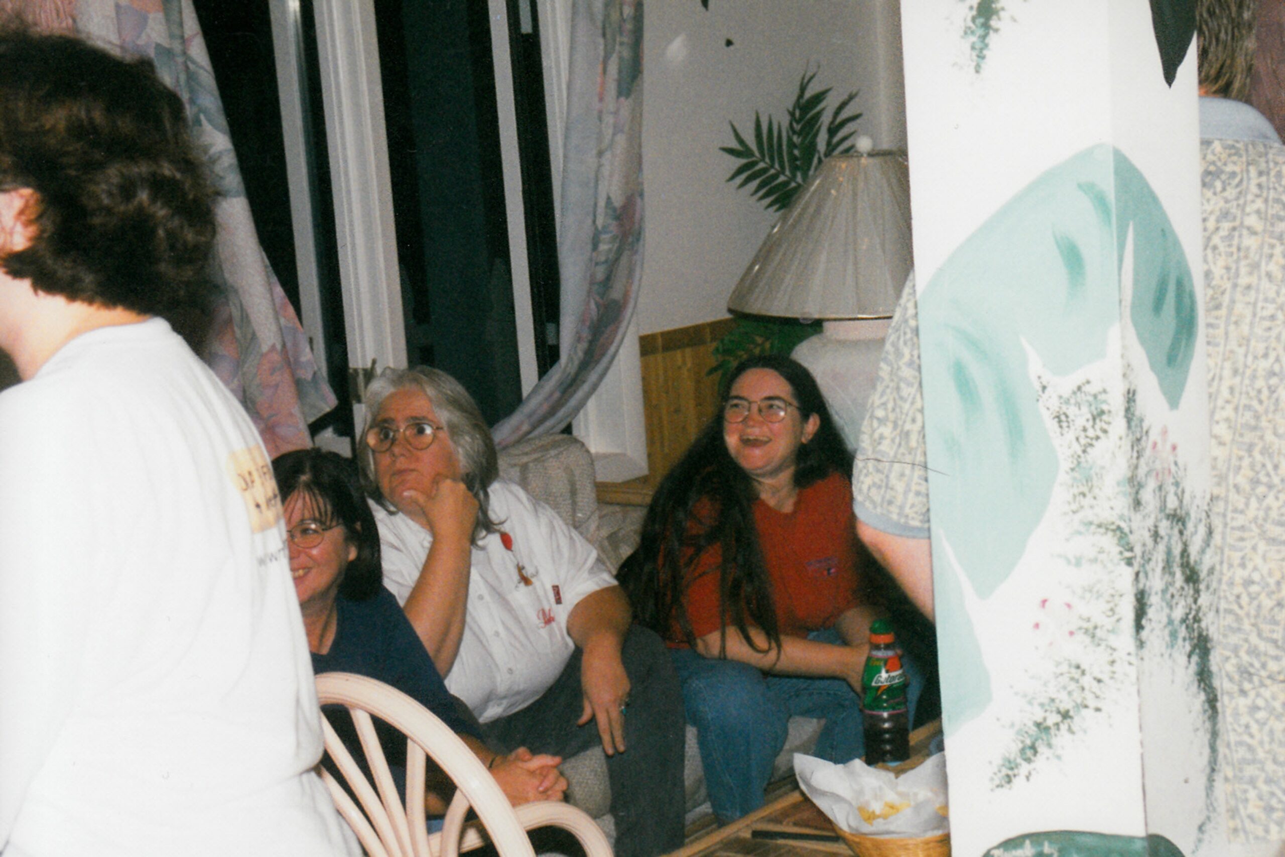 Diane, Doris and others at a Networks retreat laughing and looking to the side.