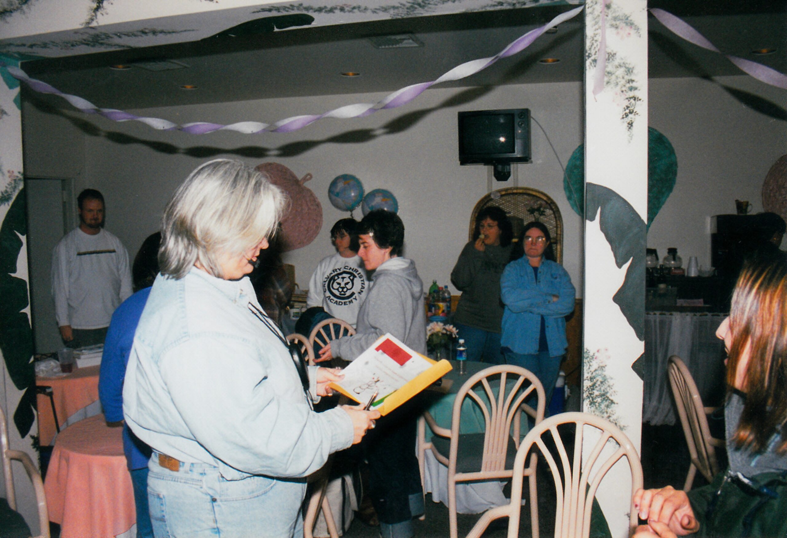Diane and others milling around at a festive event!