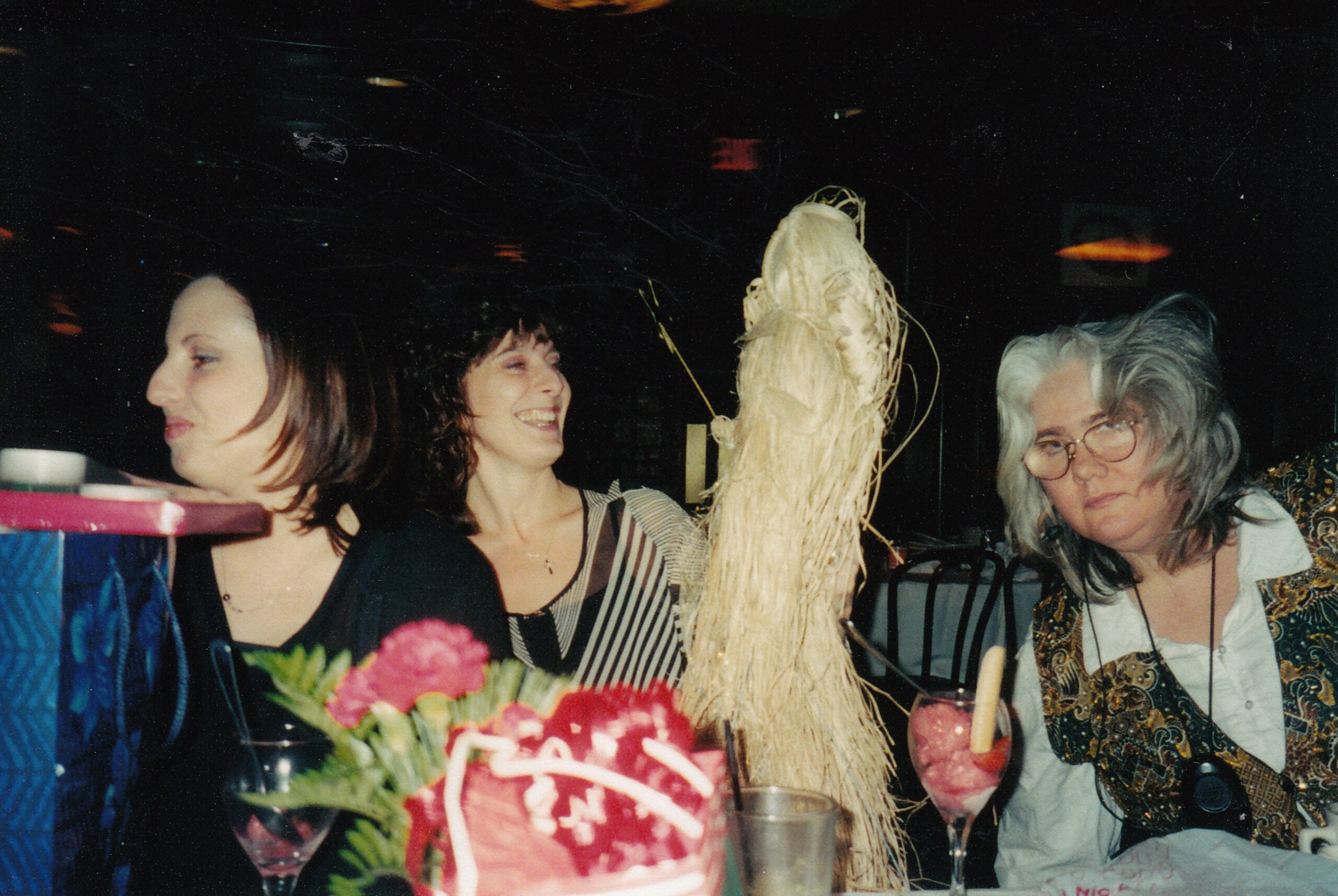 Michelle, Diane and others enjoying a nice meal together with some fun.