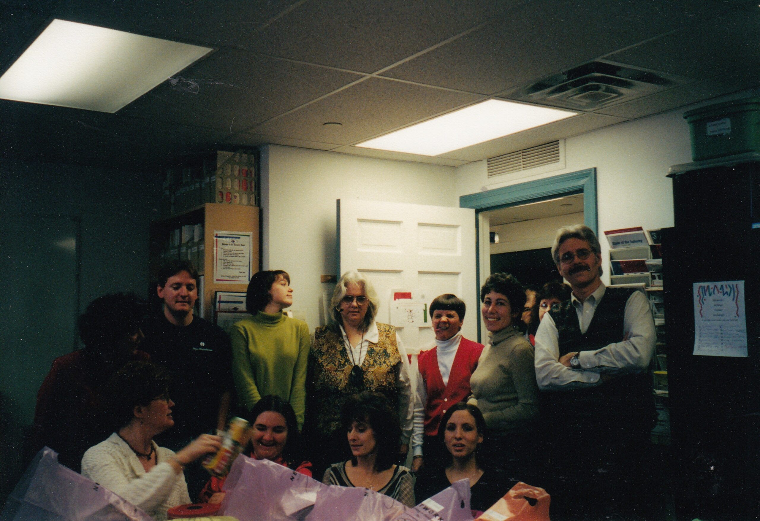 Mike, Diane, Leslie, George, Pat, Rosa Michelle, and several others pose in the Philadelphia office.