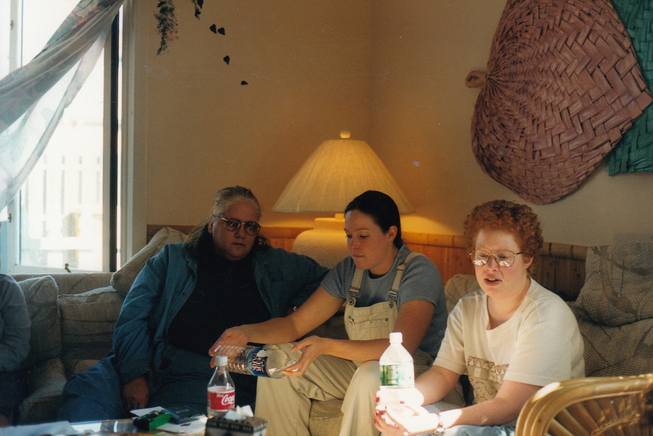 Diane, Jen and others on the couch at a retreat.