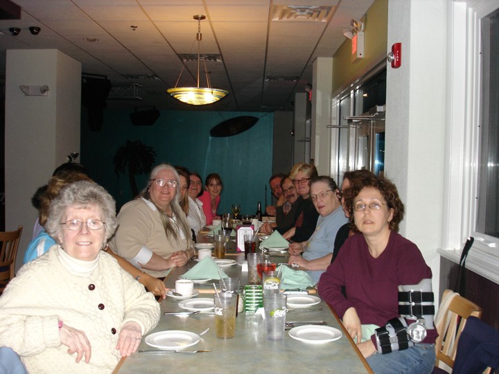 Beth, Rosa, Ruth, Jill, Diane and several others enjoying a meal.