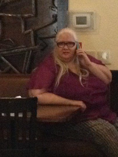 Diane talking on the phone.